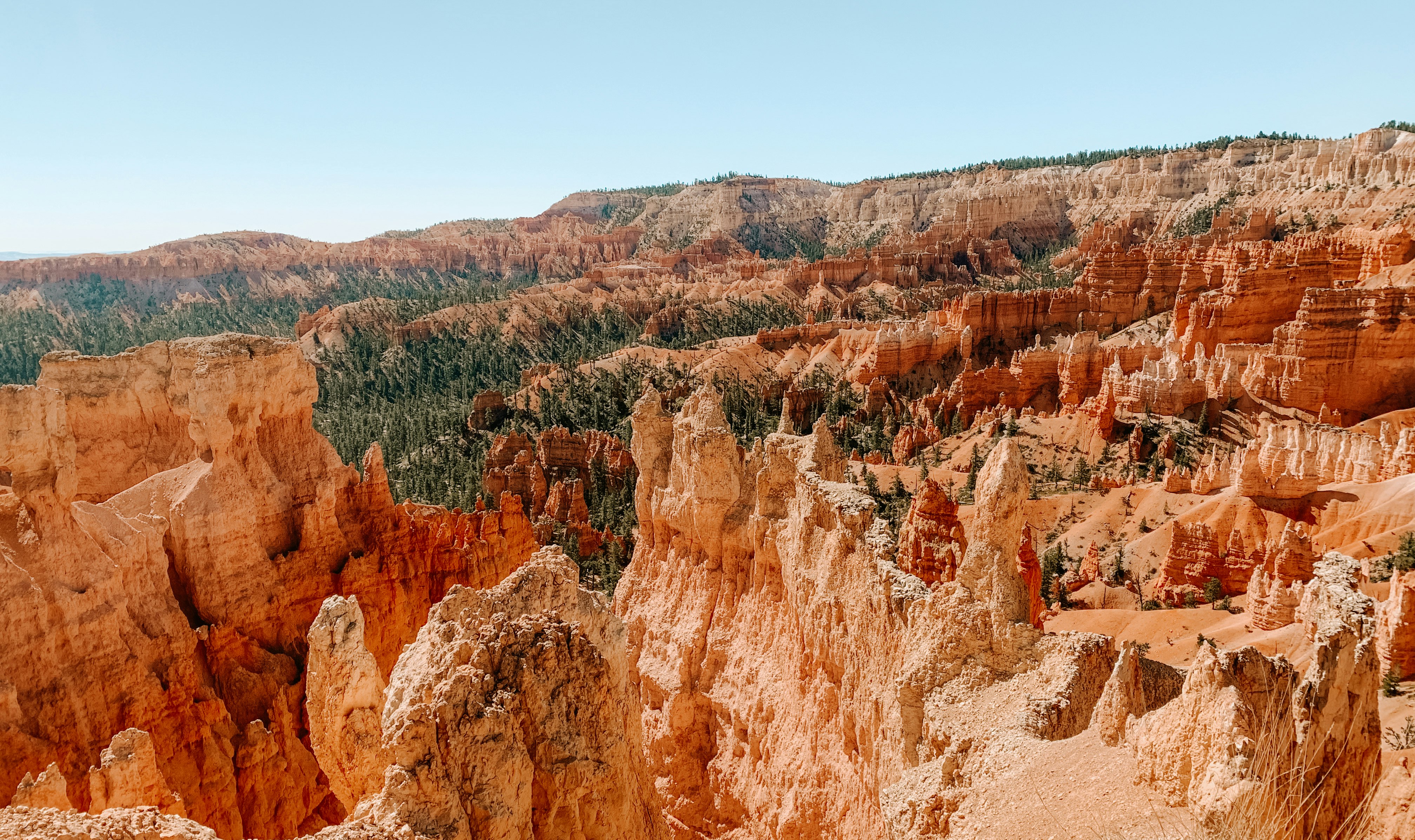 brown rock formation under blue sky during daytime